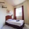 Отель OYO 90061 Kuhara Court Apartment Suite, фото 6