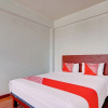 Отель OYO 93072 Asri Homestay Syariah, фото 4