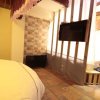 Отель Yuejinglou Inn Lijiang, фото 2