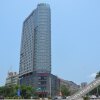 Отель Wodun Platinum Hotel (Qinzhou East Railway Station Niannianfeng Plaza) в Циньчжоу