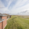 Отель exclusive holiday apartment on the dike at the North Sea, фото 1