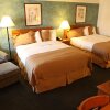 Отель Pines Inn & Suites, фото 6