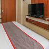 Отель Super OYO Capital O 93910 Asia Rooms @ Green Lake View Ciputat, фото 34