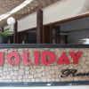 Отель Holiday Beach Inn, фото 1