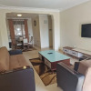Отель Eric Wilkins Apartments, фото 7