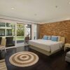 Отель Away Bali Legian Camakila Resort, фото 8