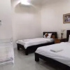 Отель OYO 1190 Ndalem Katong Guest House, фото 29