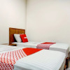 Отель OYO 90629 The Home Srengseng, фото 4
