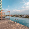 Отель RedLiving Apartemen Grand Kamala Lagoon - Kita Pro Tower Barclay North, фото 3