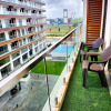 Отель Elegant 2Bed Gem-5star Service-Pools-Gym, фото 1