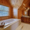 Отель Executive Plus 89 - Luxurious log Home With Private hot tub Pool Sauna and Close to Activities, фото 6