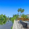 Отель Stunning Waterfront 3BR with Heated POOL, фото 37
