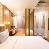 Отель Comfy And Modern Look 1Br Gateway Park Lrt City Bekasi Apartment, фото 4