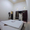 Отель OYO 1190 Ndalem Katong Guest House, фото 27