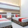 Отель OYO 3803 Hotel Wonojati Syariah Malang, фото 5