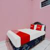 Отель OYO 90289 Lestari Syariah Homestay, фото 11