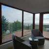 Отель Two bed bungalow with sunroom and stunning views, фото 7