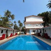 Отель Pool Side Cottages in La Paulo's B2B in Morjim, фото 1