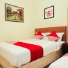 Отель OYO 465 Alam Citra Bed & Breakfast, фото 15