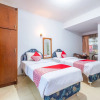Отель Oyo 943 Hotel Azalea Syariah, фото 7