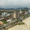 Отель Apto em Mongaguá Prédio frente mar, фото 19