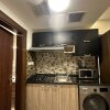 Отель Aboun Rooftop 2bedroom Khsh, фото 12