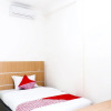 Отель Super OYO 617 Sukaraja Residence Syariah, фото 5