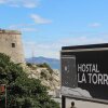 Отель Hostal La Torre в Альмуньекаре