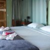 Отель Motmot, Double Large Room With air Conditioning and sea View, фото 9