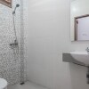 Отель Guesthouse Sepinggan Baru Syariah By RedDoorz, фото 12