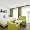 Отель NOVINA Sleep Inn Herzogenaurach, фото 5