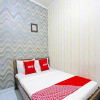 Отель OYO 91172 Trihakso Guesthouse, фото 5