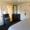 Отель Blue Spruce Motel & Townhouses, фото 3