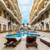 Отель Two bedroom apartment with pool Nour Plaza F31, фото 12