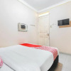 Отель Mulia Raja Kost by OYO Rooms, фото 16