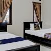 Отель OYO Life 92509 Maulana Guest House Simpur, фото 18