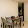 Отель Modern and Comfortable 2BR at The Empyreal Condominium Epicentrum Apartment, фото 13