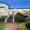 Отель The Indooroopilly Queenslander - 4 Bedroom Family Home - Private Pool - Wifi - Netflix в Брисбене