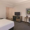 Отель La Quinta Inn & Suites by Wyndham Orlando UCF, фото 36