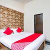 Отель RG Suits & Apartment by OYO Rooms, фото 6