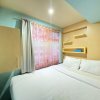 Отель Homey Living 2Br At Jarrdin Cihampelas Apartment, фото 3