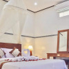 Отель Belvilla 93649 Private Villa 4 Bedroom With Pool Near Ubud, фото 2