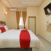 Отель Reddoorz Syariah Near Plaza Andalas Padang, фото 3