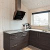 Отель Swanky Holiday Home in Blåvand With Whirlpool, фото 12