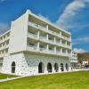 Отель Tinos Beach Hotel, фото 1