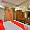 Отель Oyo 214 Quiet Inn Hotel Apartments, фото 4