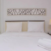 Отель Comfortable And Spacious Studio At Azalea Suites Apartment, фото 9