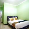 Отель Spot On 2729 Marzan Syariah Guest House, фото 6