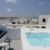 Отель Roofs of Chora, Townhouse with Rooftop Pool - Adults Only, фото 17