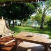 Отель Bungalow With 2 Bedrooms in Andilana, With Wonderful sea View, Shared Pool and Enclosed Garden в Дзамандзарях